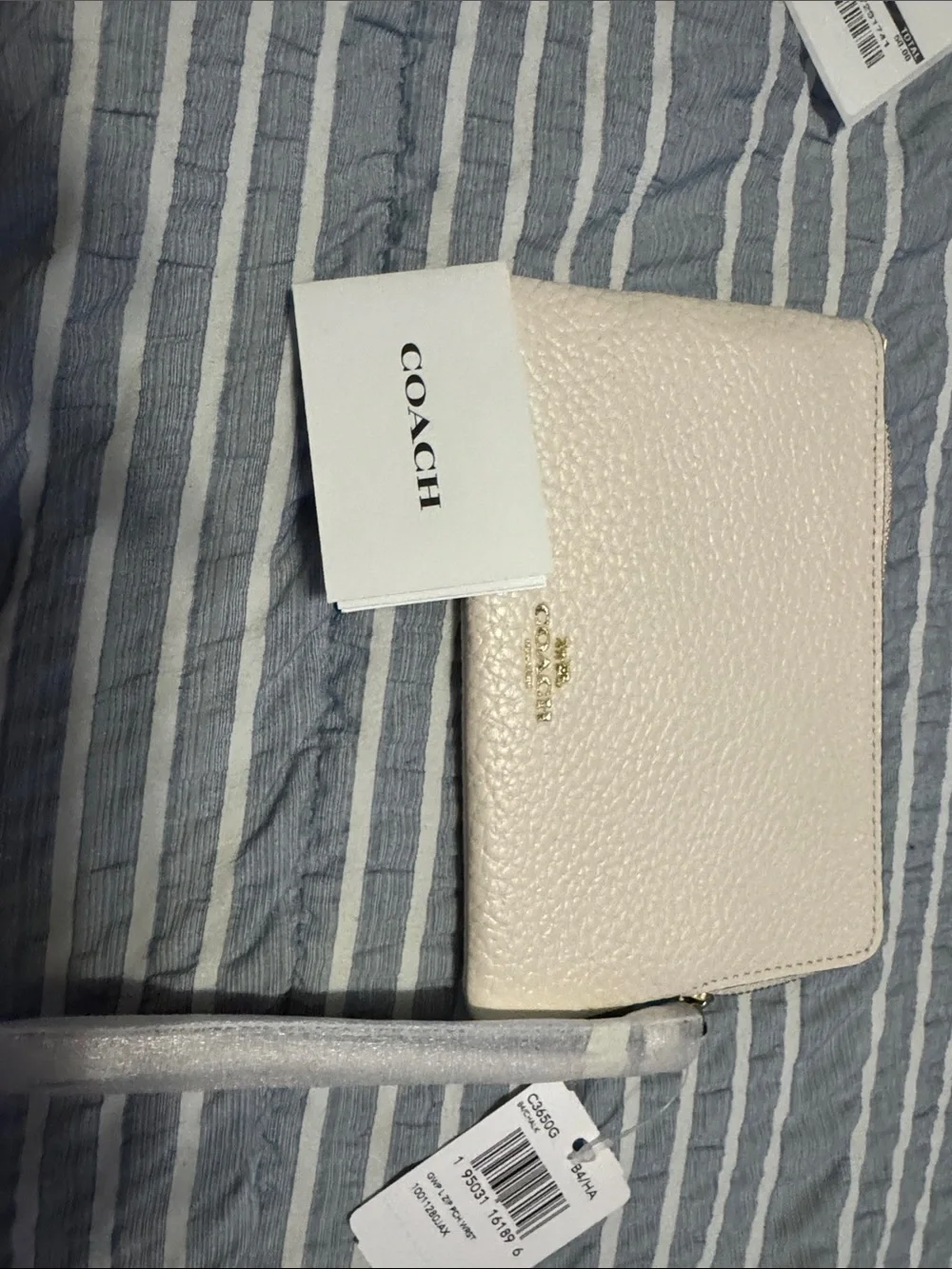 COACH Cream Pebbled Leather Wristlet Clutch with Gold Logo